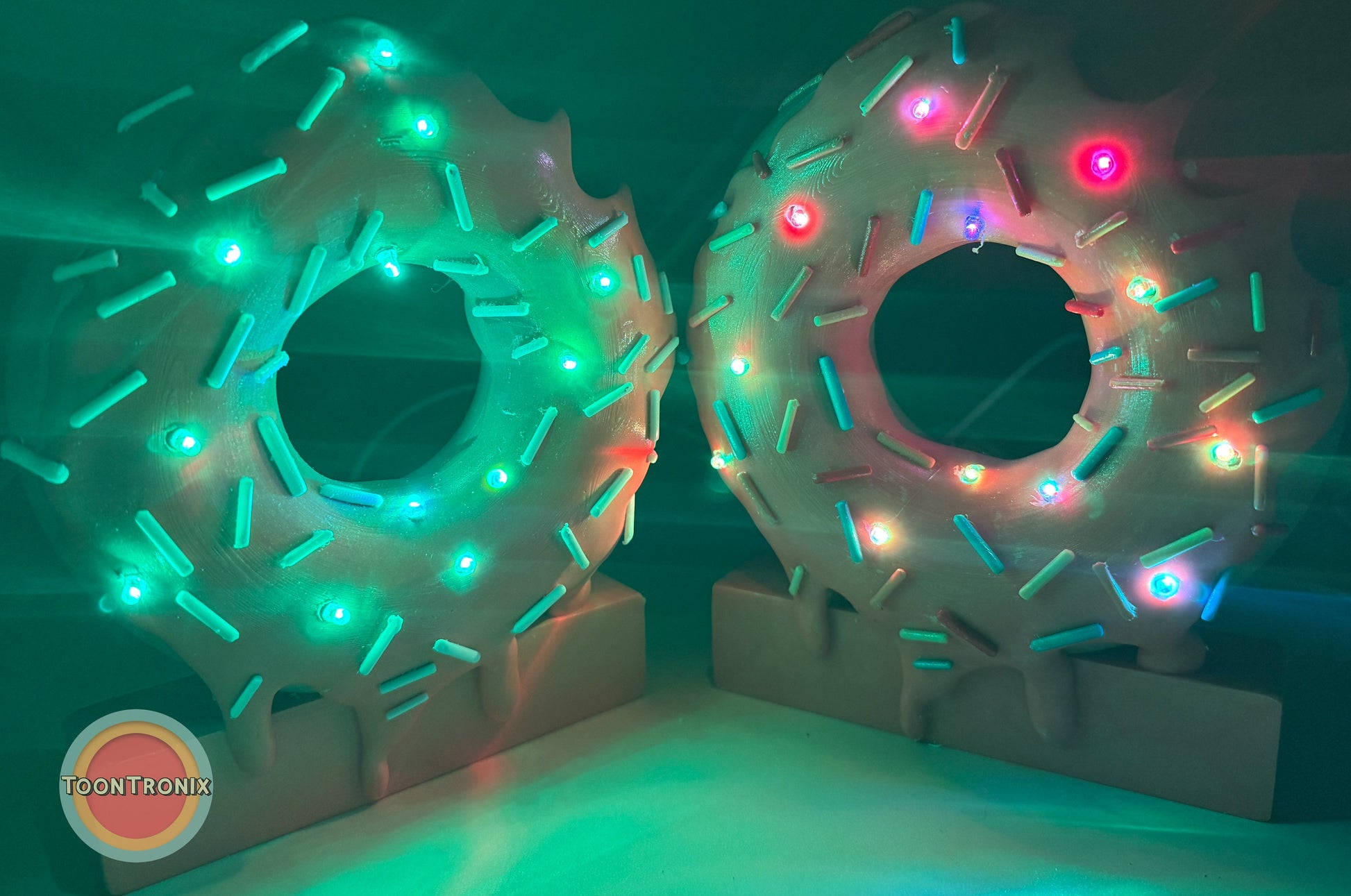 6" or 9" donut-shaped desk lamps with colorful LED sprinkles and built-in USB power cord