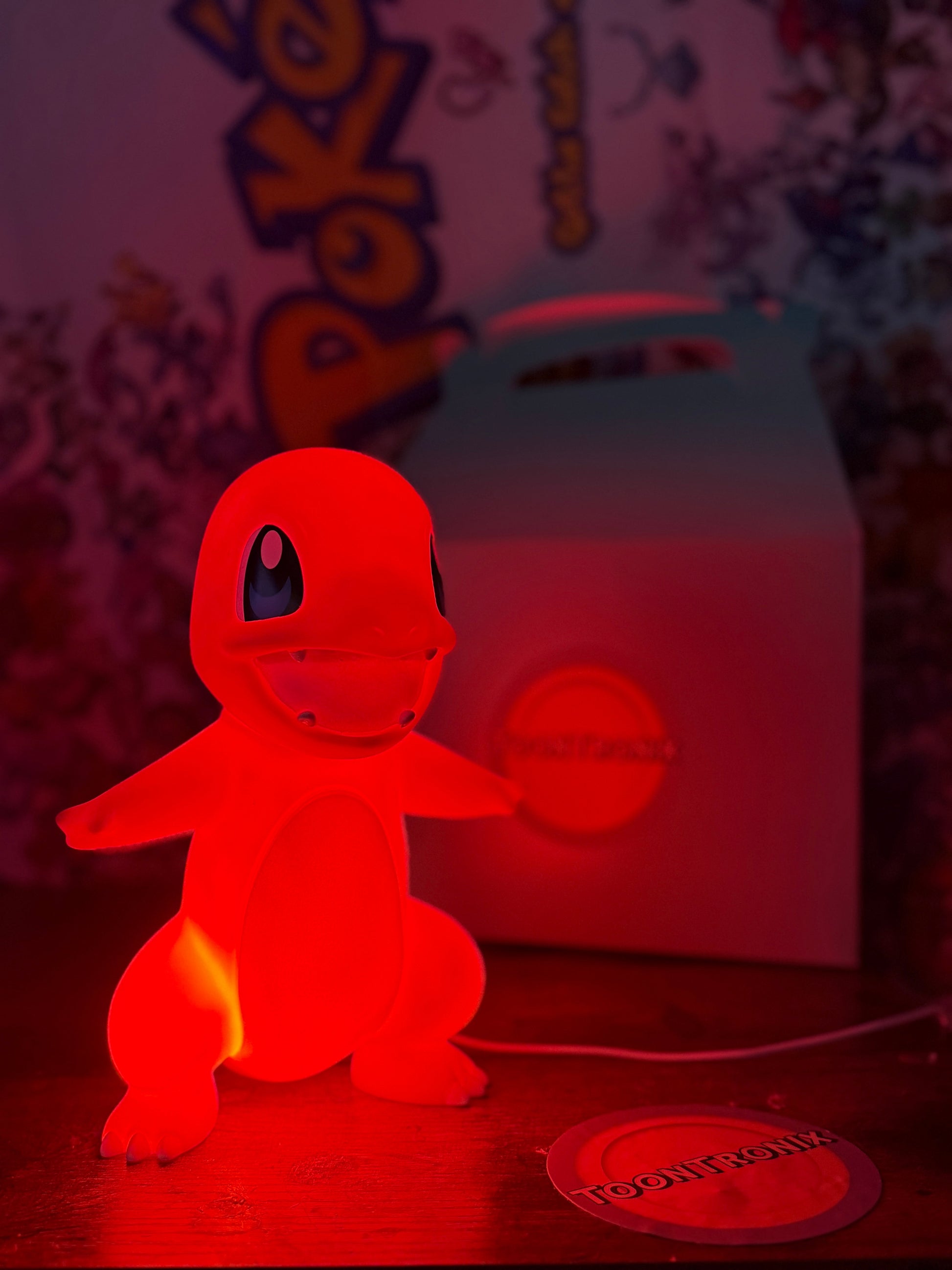 9" Charmander Statue USB desk lamp glowing red with Pokemon background and packaging