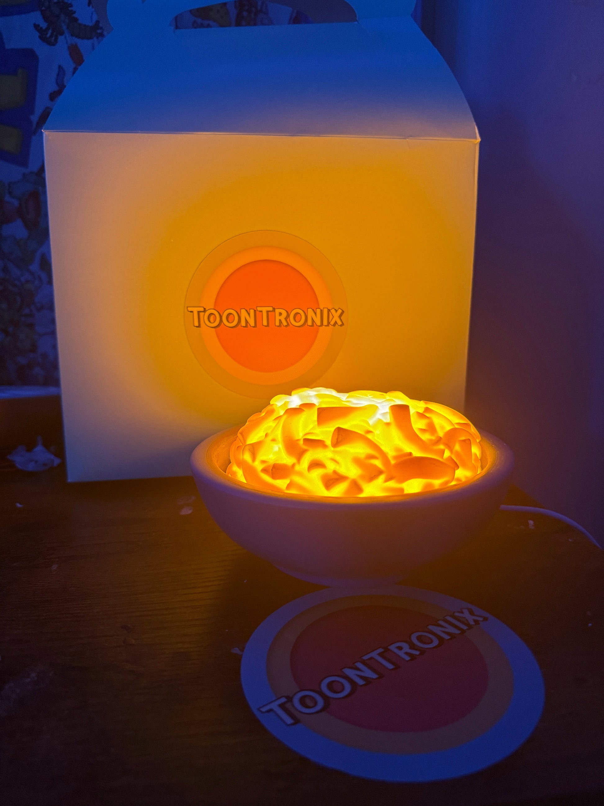 LED Mac & Cheese Desk Lamp in bowl with warm orange glow and USB power on desk decor