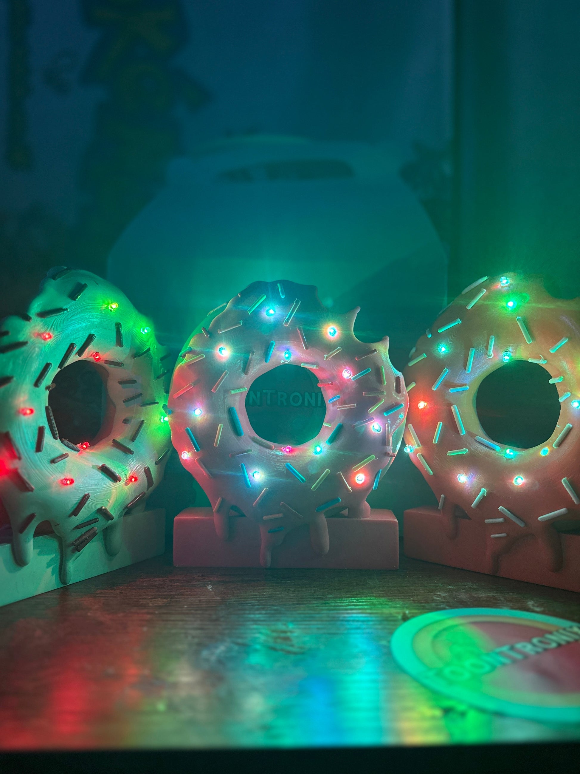 6" or 9" donut-shaped LED desk lamp with colorful sprinkles and built-in USB light