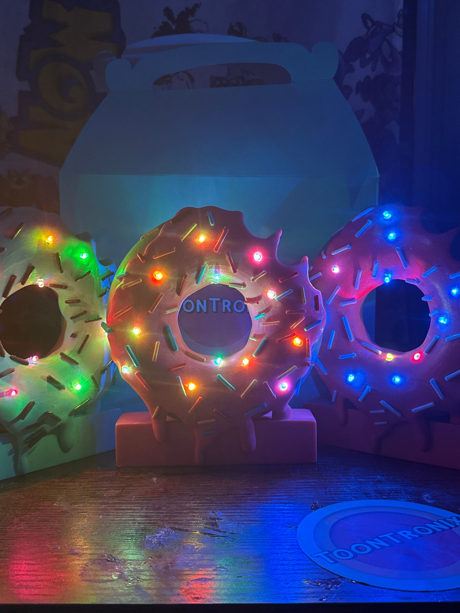 LED desk lamp shaped like a 6" or 9" donut with colorful sprinkles and built-in USB light