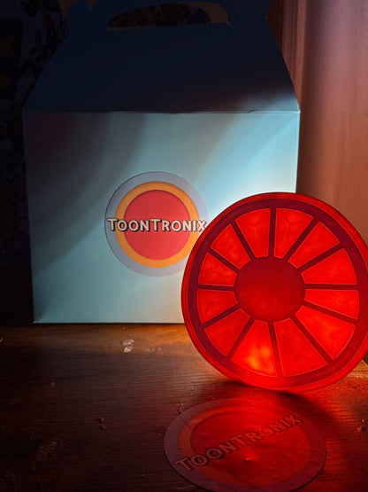 Orange desk food lamp shaped like a glowing orange slice with USB power and retro cartoon design